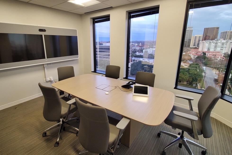 Team meeting and presentation room outfitted for video conferenceing